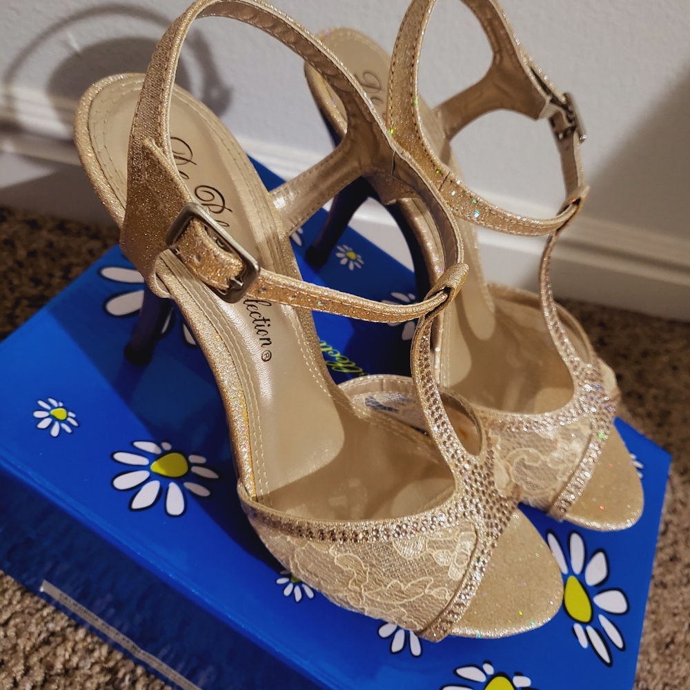 Beautiful high-heeled shoes, bright nude color, with lace and glittering stones.